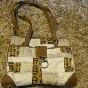 Etienne Aigner Canvas shoulder bag.